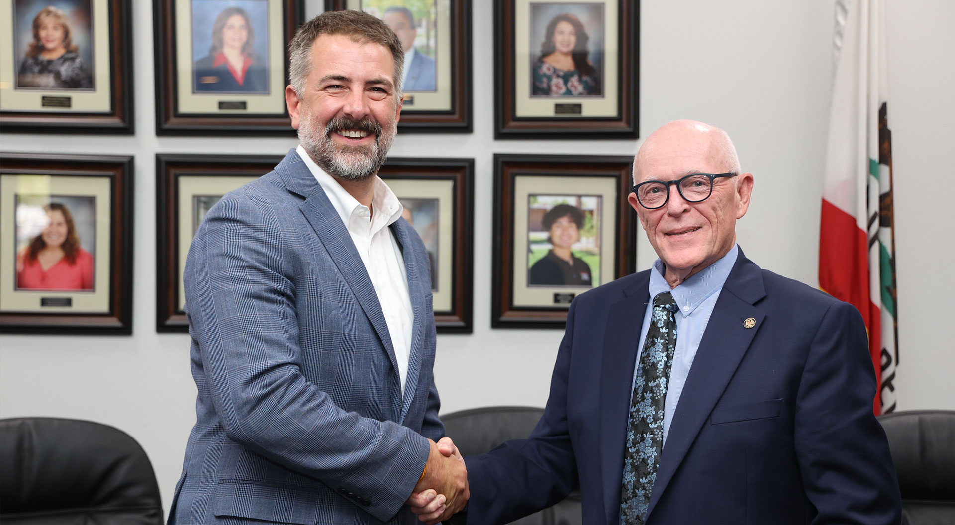 From left, University of Arizona Vice Provost Dr. Caleb Simmons shakes hands with IVC Interim Superintendent/President Dr. James M. Limbaugh following the official MOU signing. 